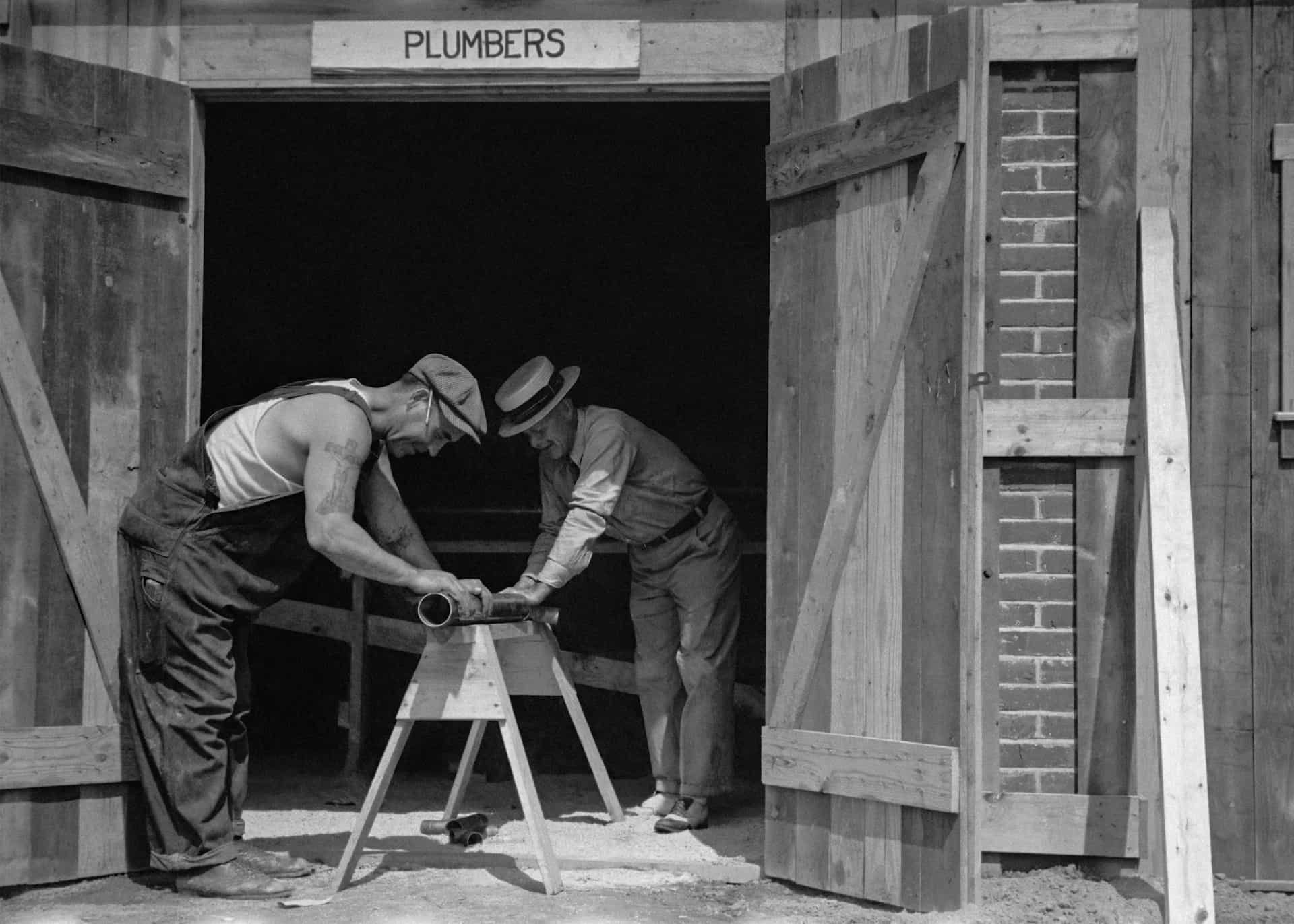 An old plumbers service store in balck white.